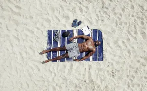 African male model sunbathing